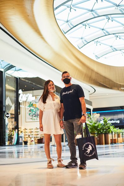 Father and daughter at shopping mall